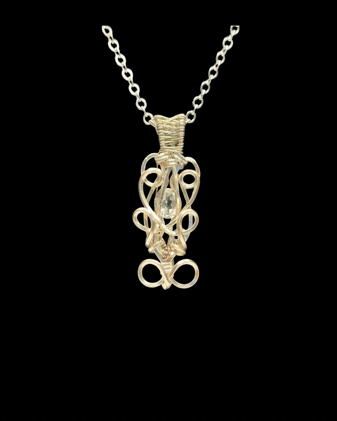 “Whirl & Wonder” Faceted Topaz Wire Wrapped Pendant