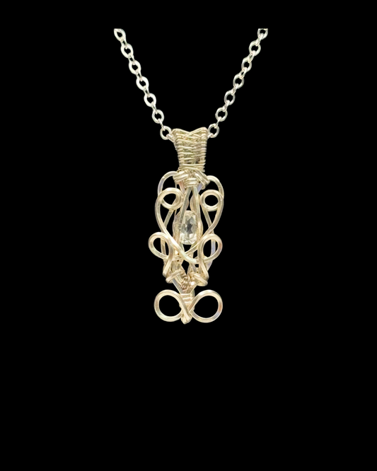 “Whirl & Wonder” Faceted Topaz Wire Wrapped Pendant